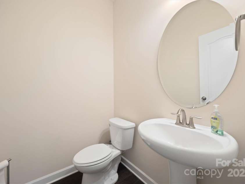 16928 Alydar Commons Lane, Charlotte, NC 28278.  MLS# CAR4289485, YatesRealty ID 31124. Powder room on main level