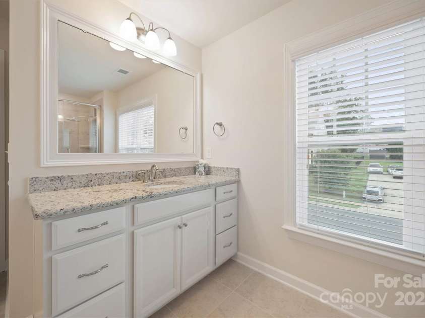 16928 Alydar Commons Lane, Charlotte, NC 28278.  MLS# CAR4289485, YatesRealty ID 31124. Separate vanities in primary bath