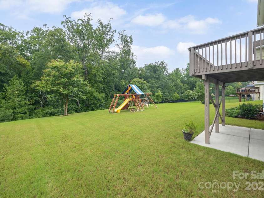 16928 Alydar Commons Lane, Charlotte, NC 28278.  MLS# CAR4289485, YatesRealty ID 31124. You will love relaxing and entertaining in this backyard!!