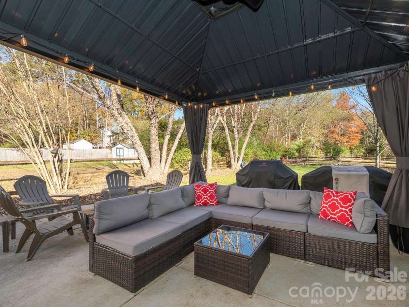 3930 Huntmeadow Drive, Charlotte, NC 28269.  MLS# CAR4387063, YatesRealty ID 31125. Add to your living space with this amazing outdoor space