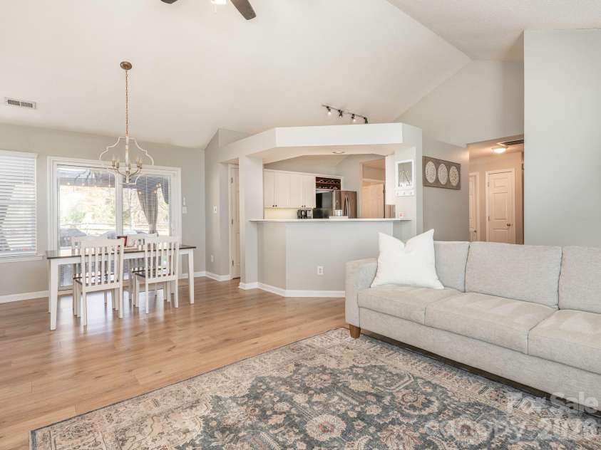3930 Huntmeadow Drive, Charlotte, NC 28269.  MLS# CAR4387063, YatesRealty ID 31125. Dining Area and access to Kitchen from the Living Room
