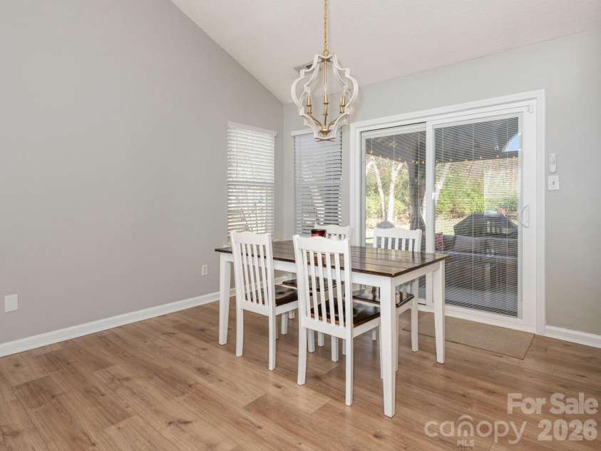 3930 Huntmeadow Drive, Charlotte, NC 28269.  MLS# CAR4387063, YatesRealty ID 31125. Dining Area with direct access to patio
