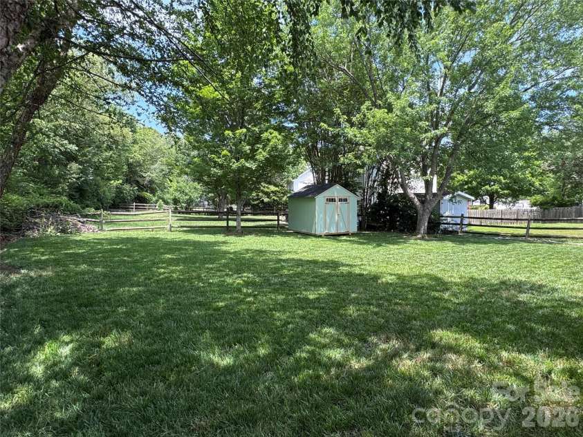 3930 Huntmeadow Drive, Charlotte, NC 28269.  MLS# CAR4387063, YatesRealty ID 31125. Shed out back for additional storage