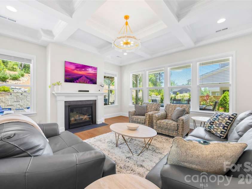 1368 Cedardale Lane, Denver, NC 28037.  MLS# CAR4391395, YatesRealty ID 31129. Living Room with Cofferred Ceiling and Fireplace