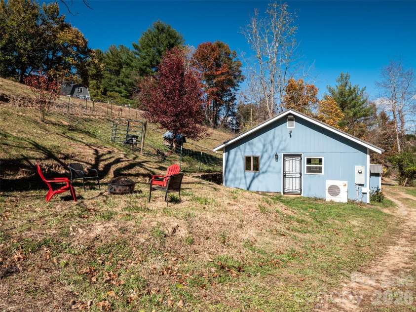 70 Vintage Place, Canton, NC 28716.  MLS# CAR4363944, YatesRealty ID 31132. Fire pit area