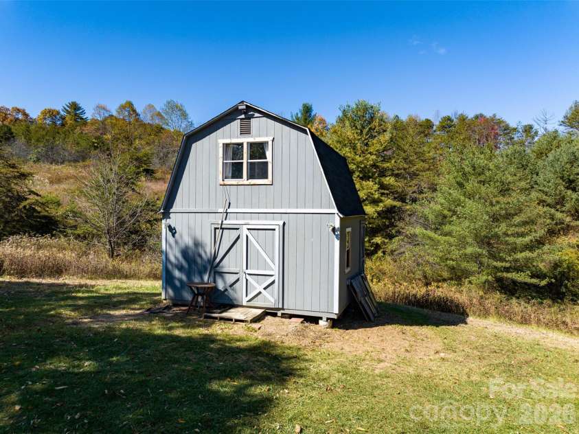 70 Vintage Place, Canton, NC 28716.  MLS# CAR4363944, YatesRealty ID 31132. Second wired building with well water, currently for guests.
