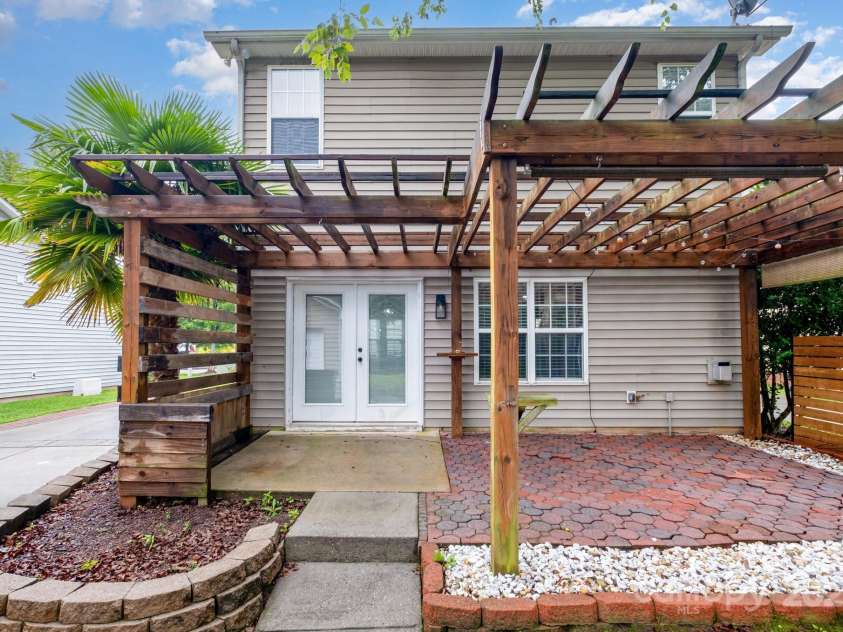 10974 Heritage Green Drive, Cornelius, NC 28031.  MLS# CAR4282858, YatesRealty ID 31134. Backyard oasis - perfect for entertaining