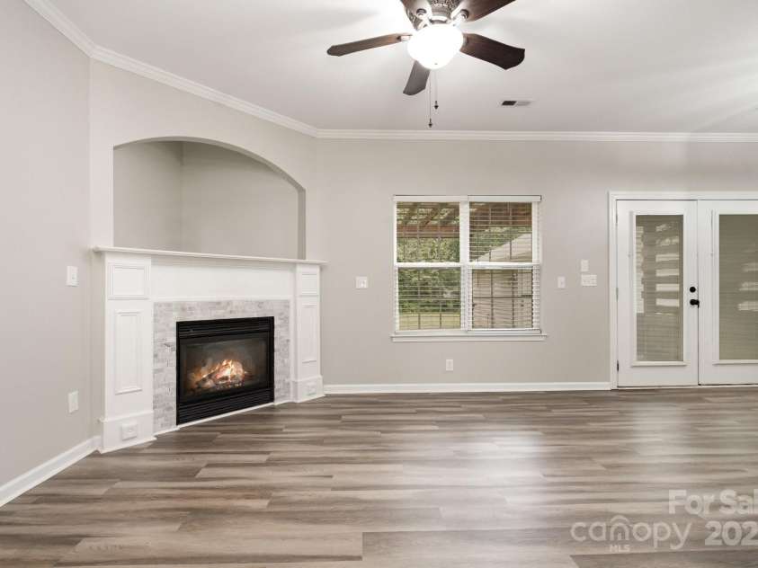 10974 Heritage Green Drive, Cornelius, NC 28031.  MLS# CAR4282858, YatesRealty ID 31134. Family Room opens to back yard