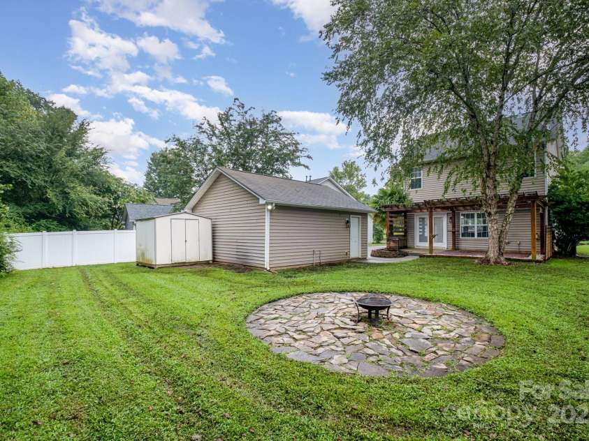 10974 Heritage Green Drive, Cornelius, NC 28031.  MLS# CAR4282858, YatesRealty ID 31134. Private backyard  