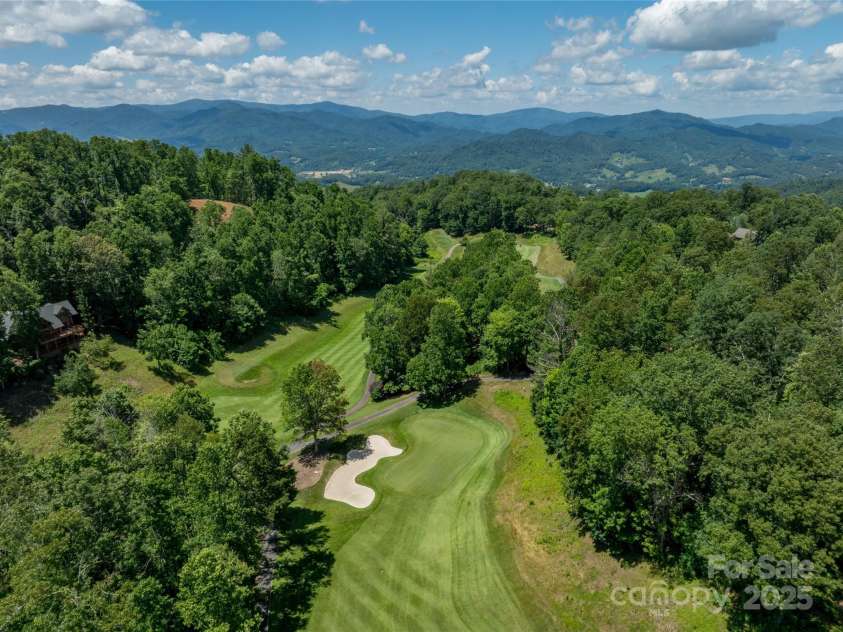 296 Austin Mountain Drive, Burnsville, NC 28714.  MLS# CAR4278654, YatesRealty ID 31142. Golf Course & View