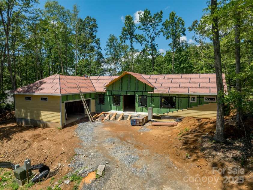 296 Austin Mountain Drive, Burnsville, NC 28714.  MLS# CAR4278654, YatesRealty ID 31142. Under construction exterior