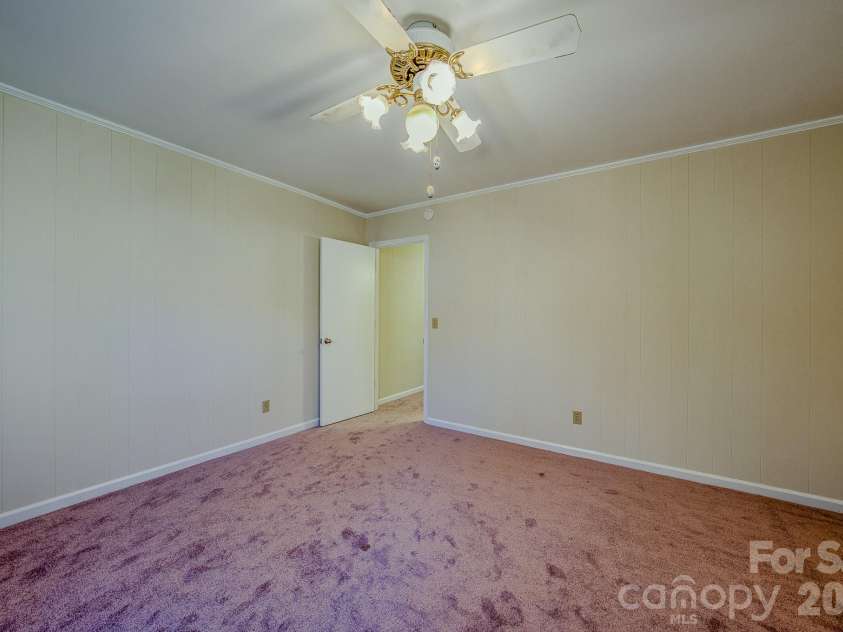 410 Avena Road, Black Mountain, NC 28711.  MLS# CAR4393879, YatesRealty ID 31145. Upper-level bedroom 1