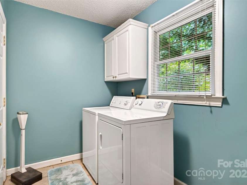 19 Moriah Lane, Asheville, NC 28803.  MLS# CAR4277964, YatesRealty ID 31150. Dedicated laundry room