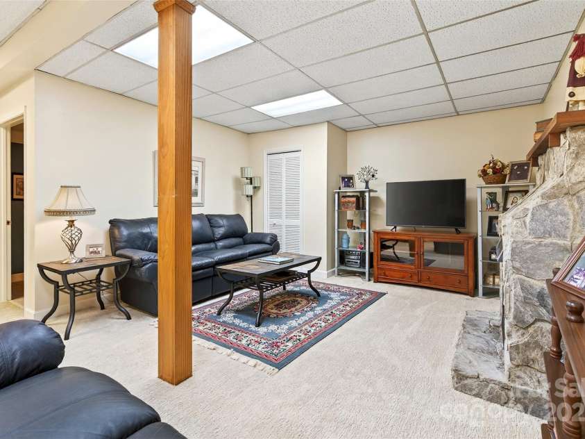 19 Moriah Lane, Asheville, NC 28803.  MLS# CAR4277964, YatesRealty ID 31150. Lower level den