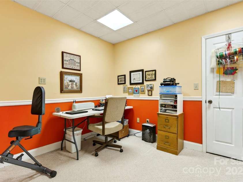19 Moriah Lane, Asheville, NC 28803.  MLS# CAR4277964, YatesRealty ID 31150. Lower level office