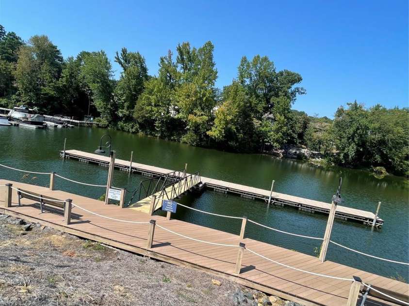 19942 Scanmar Lane, Cornelius, NC 28031.  MLS# CAR4381771, YatesRealty ID 31153. Day dock is located just down the ramp for easy loading and unloading of your boat passengers. 
