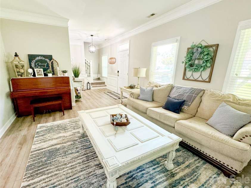 19942 Scanmar Lane, Cornelius, NC 28031.  MLS# CAR4381771, YatesRealty ID 31153. Formal Living Room.  Solid Flooring through