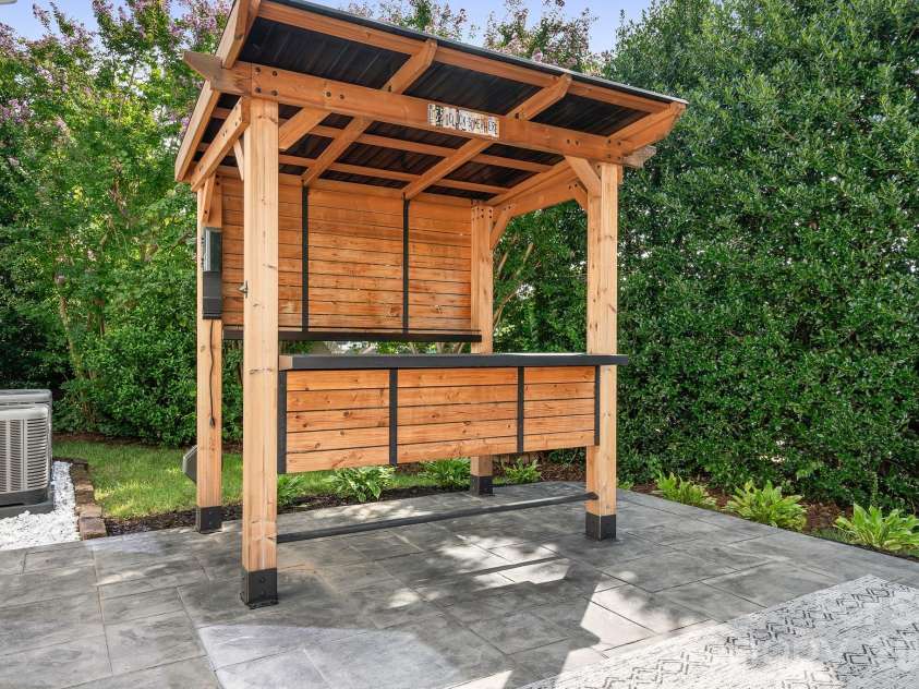 19942 Scanmar Lane, Cornelius, NC 28031.  MLS# CAR4381771, YatesRealty ID 31153. Outdoor bar will convey. Can Fit 4 Barstools too!