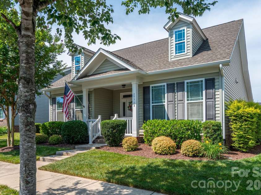 17718 Morehampton Avenue, Cornelius, NC 28031.  MLS# CAR4389501, YatesRealty ID 31154. Lush landscaping in front and back!