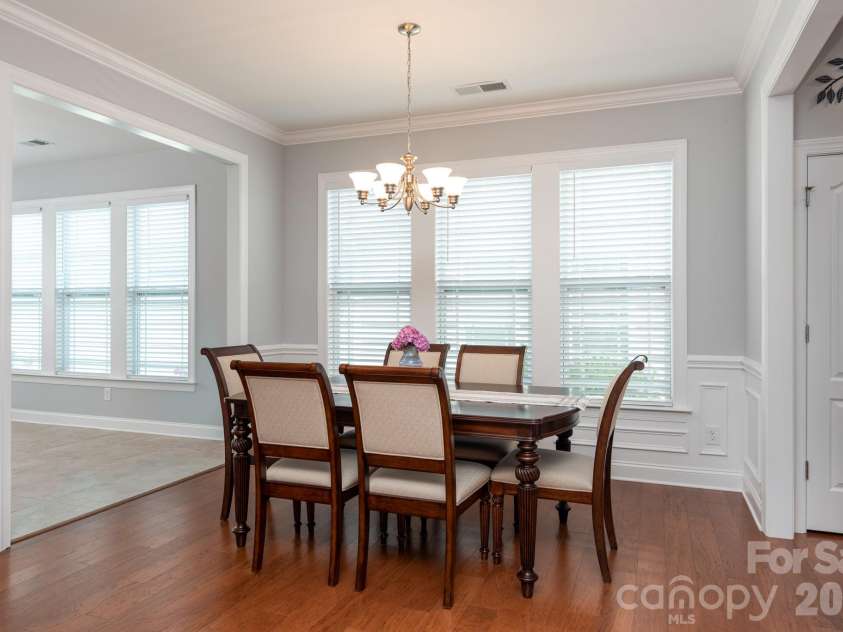 17718 Morehampton Avenue, Cornelius, NC 28031.  MLS# CAR4389501, YatesRealty ID 31154. Spacious dining room- lots of light!