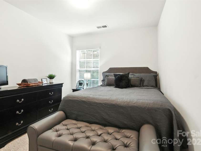 6018 Guildford Hill Lane, Charlotte, NC 28215.  MLS# CAR4287147, YatesRealty ID 31154. Comfortable secondary bedroom with space to include a full or queen size bed.