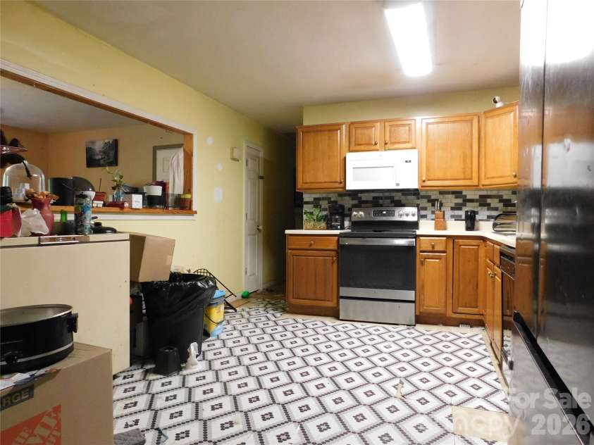 102 Jeff Street, Hendersonville, NC 28739.  MLS# CAR4354094, YatesRealty ID 31155. Large Kitchen.
