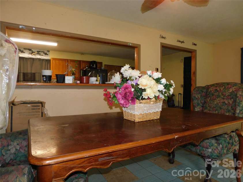 102 Jeff Street, Hendersonville, NC 28739.  MLS# CAR4354094, YatesRealty ID 31155. Pass through from kitchen to dining makes for easy entertaining.