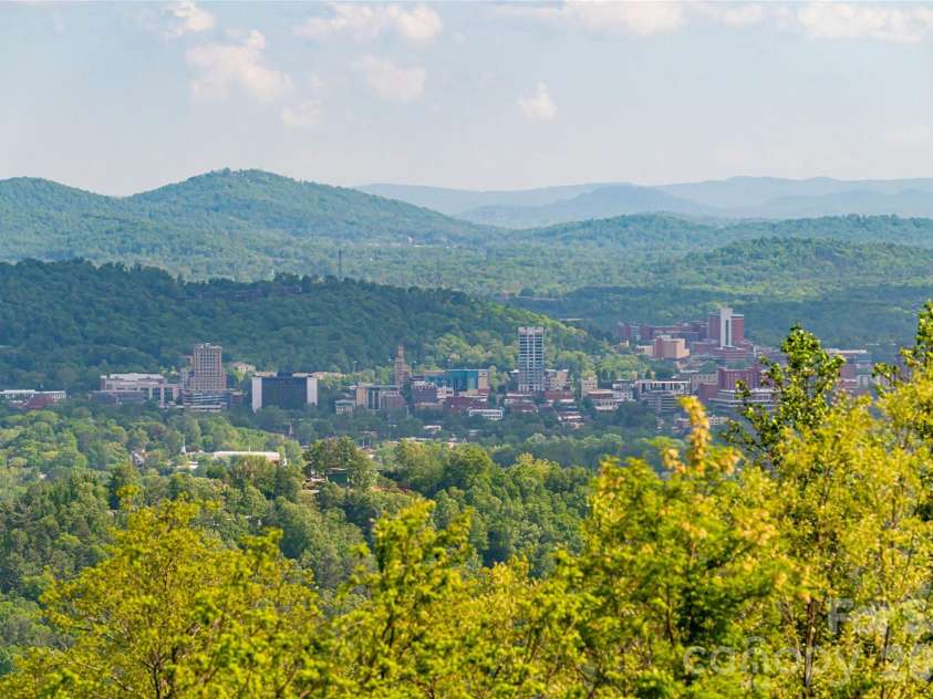 83 Summit Tower Circle, Asheville, NC 28804.  MLS# CAR4377034, YatesRealty ID 31160. 