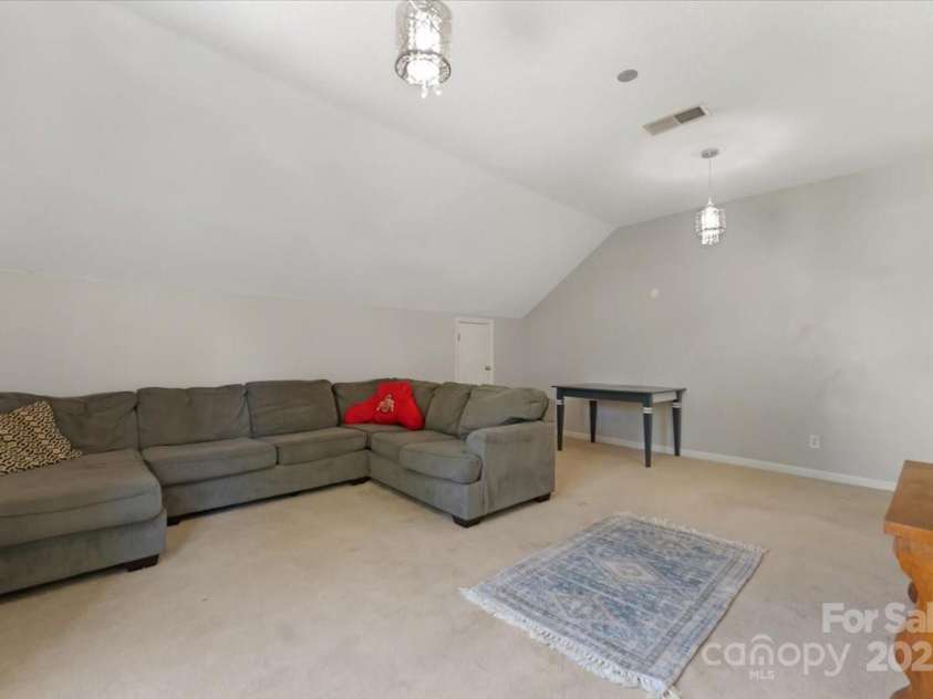 1524 Candlewyck Court, Kannapolis, NC 28081.  MLS# CAR4279653, YatesRealty ID 31163. Spacious 4th bedroom or bonus room on the second floor featuring a walk-in closet and convenient attic access