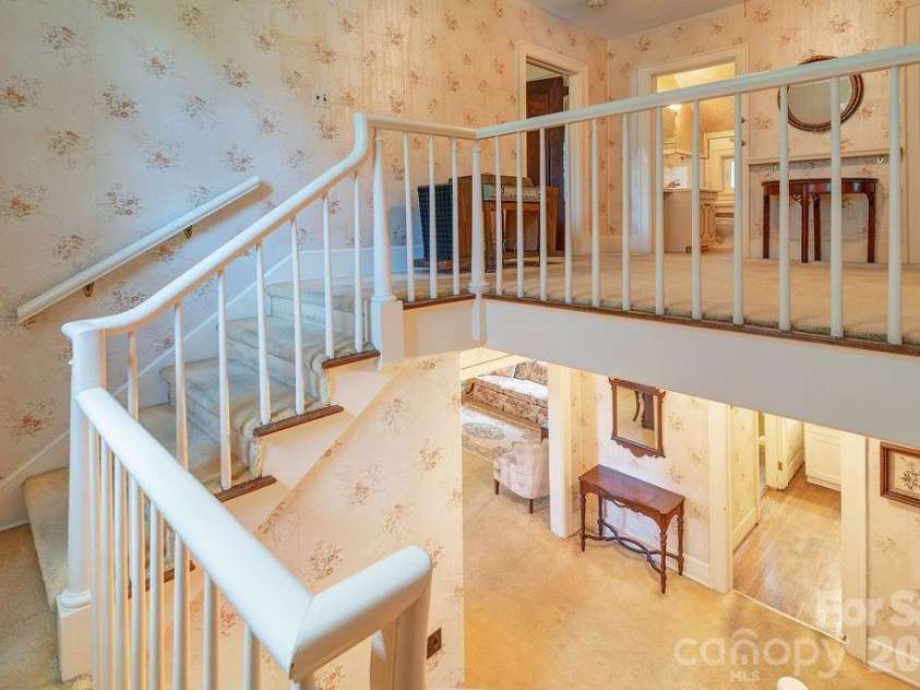88 Bear Creek Road, Asheville, NC 28806.  MLS# CAR4373598, YatesRealty ID 31166. A grand stairwell.