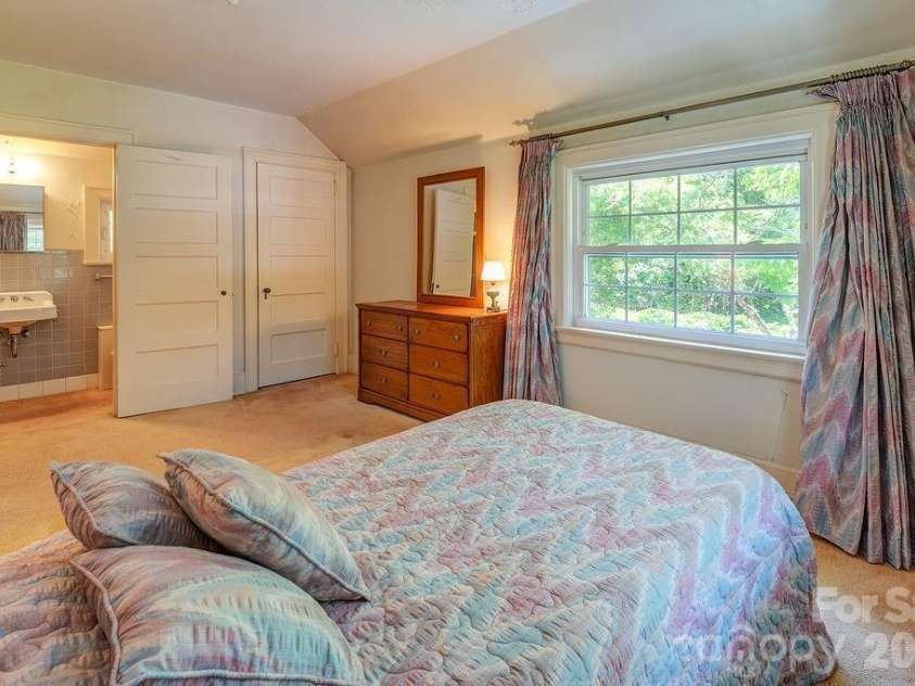 88 Bear Creek Road, Asheville, NC 28806.  MLS# CAR4373598, YatesRealty ID 31166. Bedroom 2 with ensuite, upstairs.