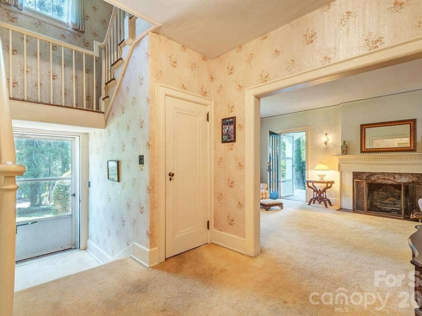 88 Bear Creek Road, Asheville, NC 28806.  MLS# CAR4373598, YatesRealty ID 31166. Grand entrance and stairwell.