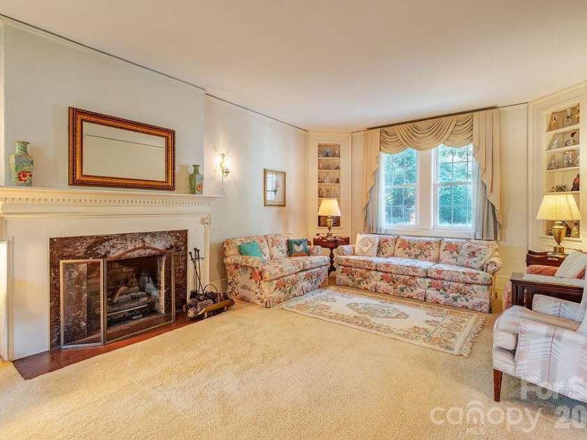 88 Bear Creek Road, Asheville, NC 28806.  MLS# CAR4373598, YatesRealty ID 31166. Large living room with gas fireplace.