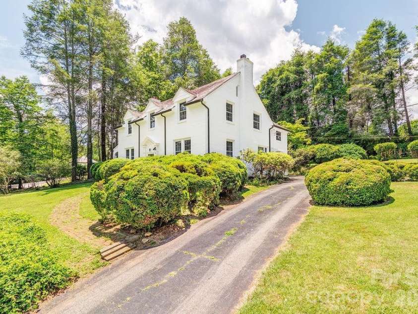 88 Bear Creek Road, Asheville, NC 28806.  MLS# CAR4373598, YatesRealty ID 31166. The home is set back from the road.