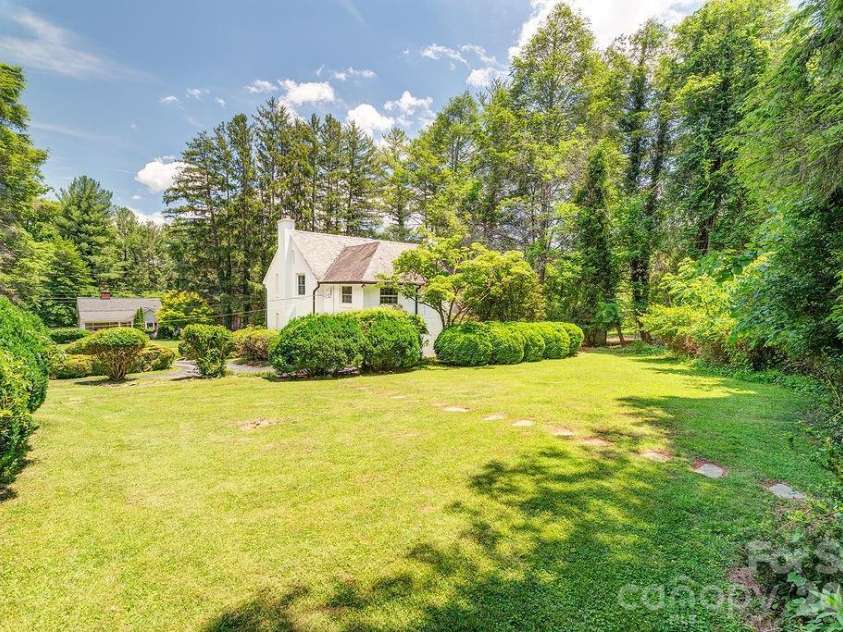88 Bear Creek Road, Asheville, NC 28806.  MLS# CAR4373598, YatesRealty ID 31166. Yard with room for carriage house or pool?