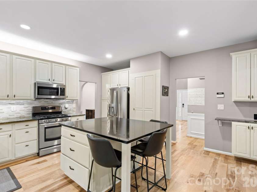 1126 Arrow Lake Court, Indian Land, SC 29707.  MLS# CAR4392349, YatesRealty ID 31168. Bright kitchen with tile backsplash