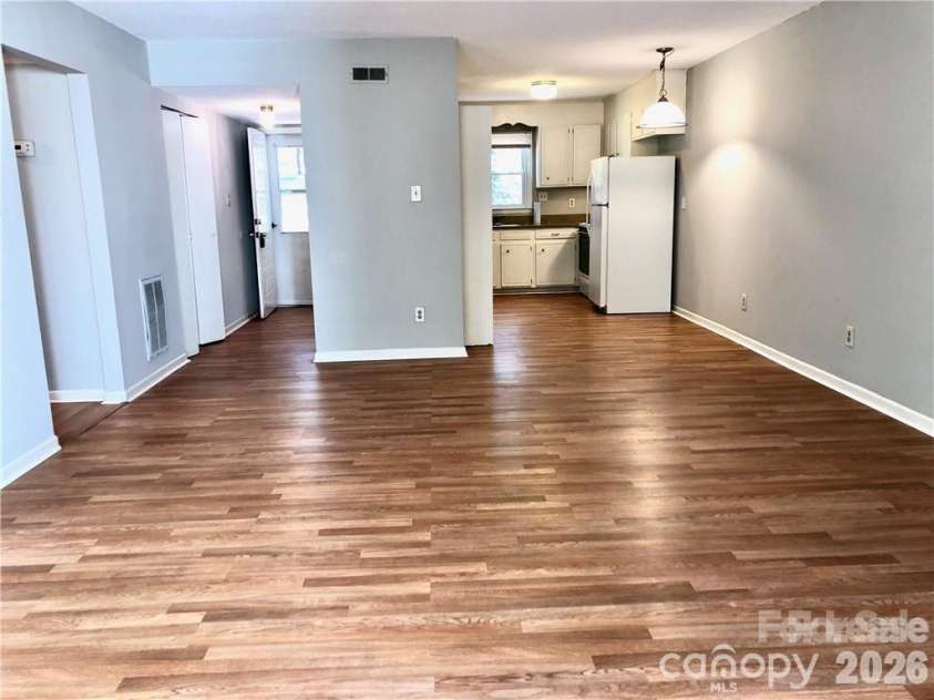 11701 Shandon Circle, Charlotte, NC 28226.  MLS# CAR4392622, YatesRealty ID 31169. Great Room looking back toward Kitchen