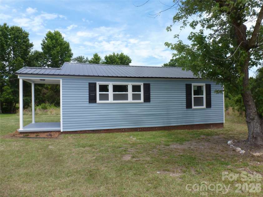 3215 Flat Creek Road, Lancaster, SC 29720.  MLS# CAR4394390, YatesRealty ID 31178. Front Exterior