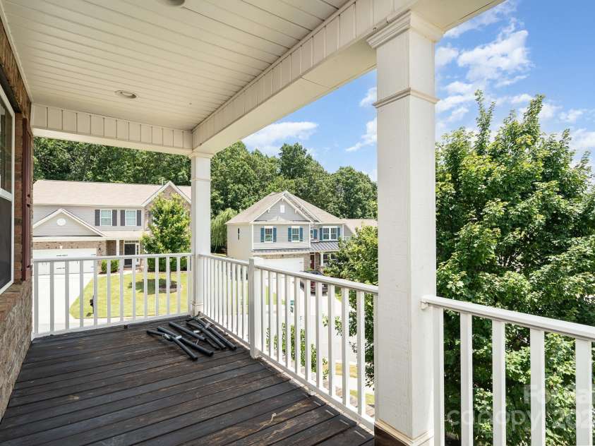 6211 Canyon Trail, Denver, NC 28037.  MLS# CAR4277710, YatesRealty ID 31180. Charleston style upper covered porch