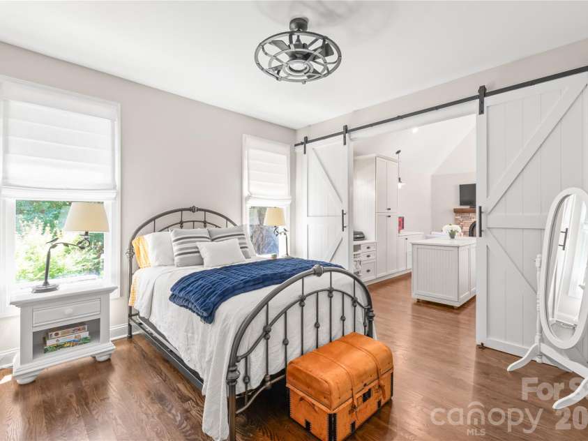 25017 Stonekirk Lane, Fort Mill, SC 29707.  MLS# CAR4383231, YatesRealty ID 31182. The ultimate floorplan flex: a rare, full main-level 2nd Living Quarters featuring a private bedroom, living area, full kitchen, and an accessible zero-entry shower.