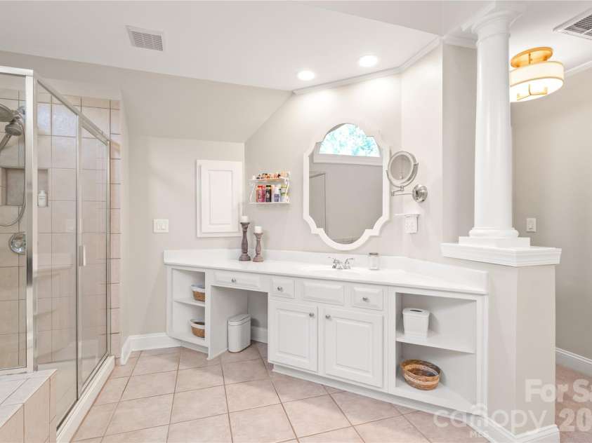 25017 Stonekirk Lane, Fort Mill, SC 29707.  MLS# CAR4383231, YatesRealty ID 31182. With its generous size and excellent layout, this walk-in shower provides a fantastic, solid foundation and all the space you need to add your personal modern design touches.
