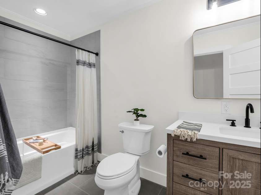 5990 Nc 9 Highway, Tryon, NC 28782.  MLS# CAR4281496, YatesRealty ID 31184. Guest Bathroom