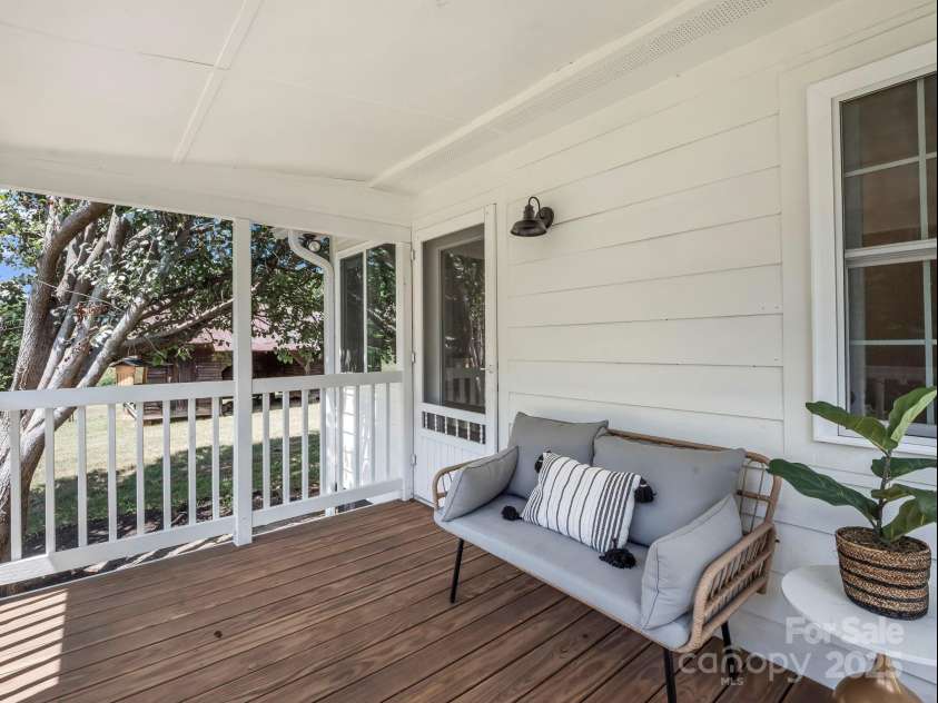 5990 Nc 9 Highway, Tryon, NC 28782.  MLS# CAR4281496, YatesRealty ID 31184. Primary Suite - It's Own Porch!