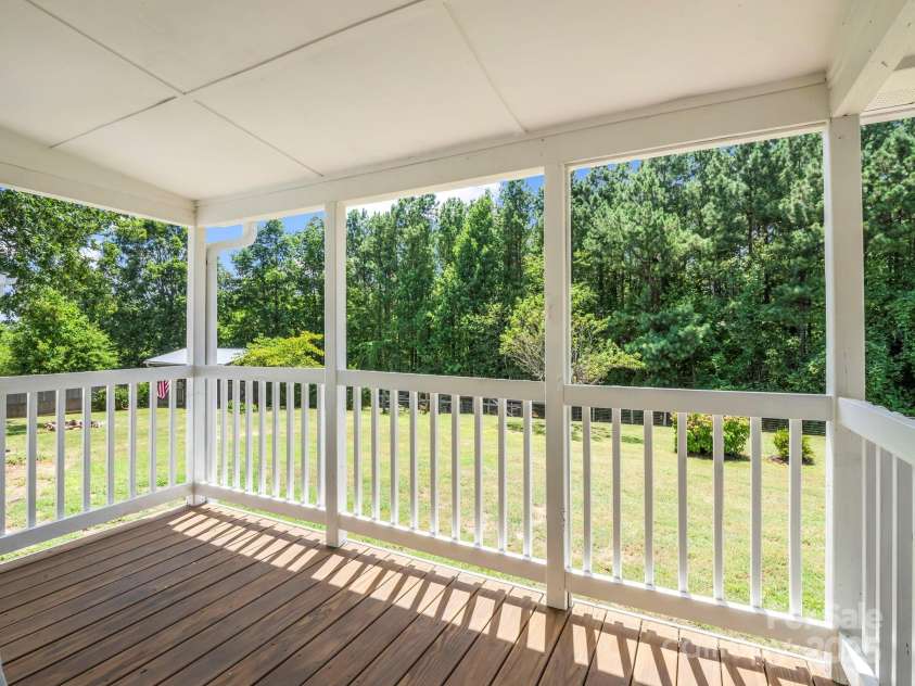 5990 Nc 9 Highway, Tryon, NC 28782.  MLS# CAR4281496, YatesRealty ID 31184. Primary Suite - It's Own Porch!