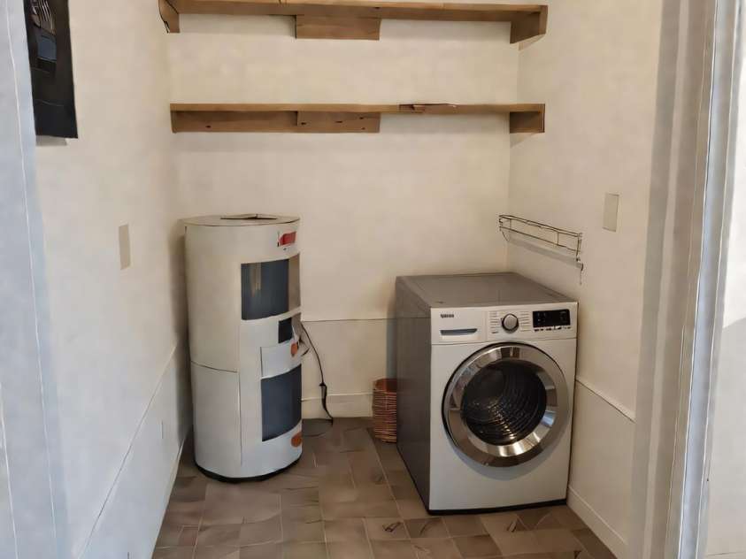 206 Fox Den Road, Troy, NC 27371.  MLS# CAR4209454, YatesRealty ID 3119. AI-virtual Picture of laundry room
