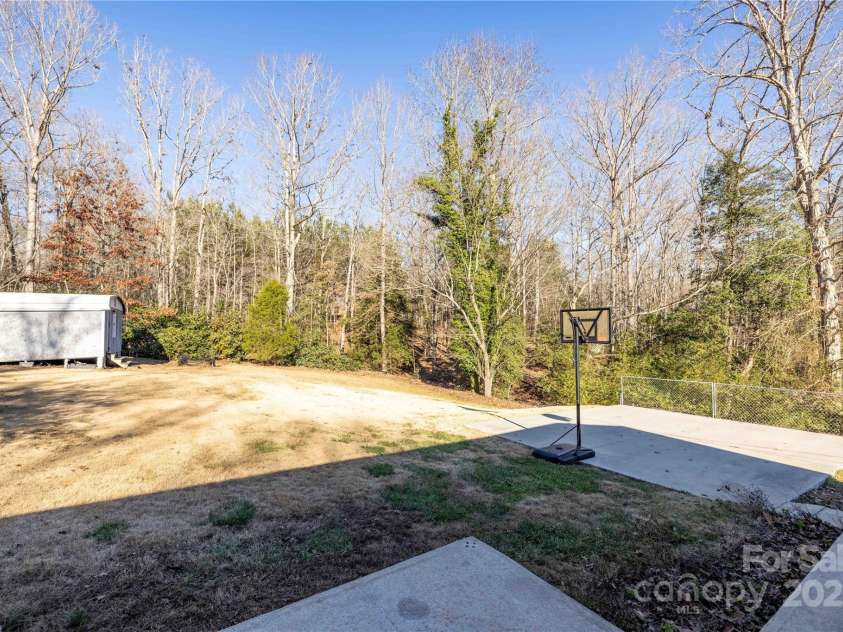 206 Fox Den Road, Troy, NC 27371.  MLS# CAR4209454, YatesRealty ID 3119. Back yard