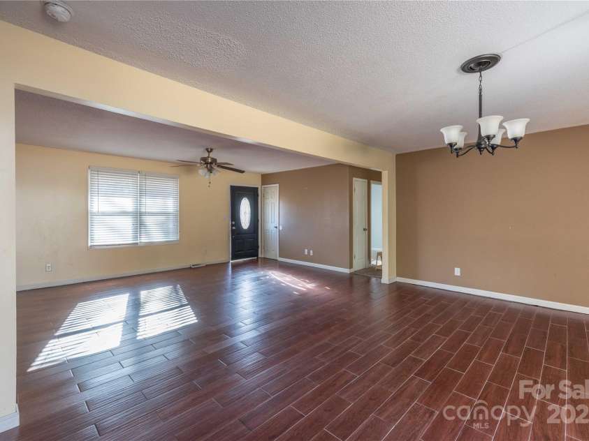 206 Fox Den Road, Troy, NC 27371.  MLS# CAR4209454, YatesRealty ID 3119. Dining room/Living area