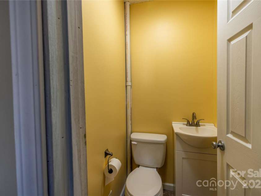 206 Fox Den Road, Troy, NC 27371.  MLS# CAR4209454, YatesRealty ID 3119. Half Bathroom