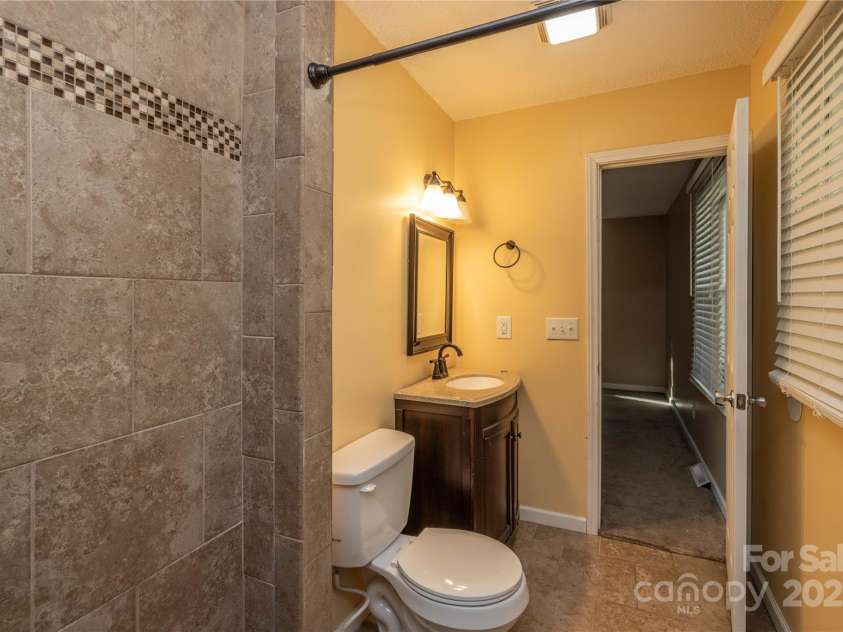 206 Fox Den Road, Troy, NC 27371.  MLS# CAR4209454, YatesRealty ID 3119. Primary Bathroom