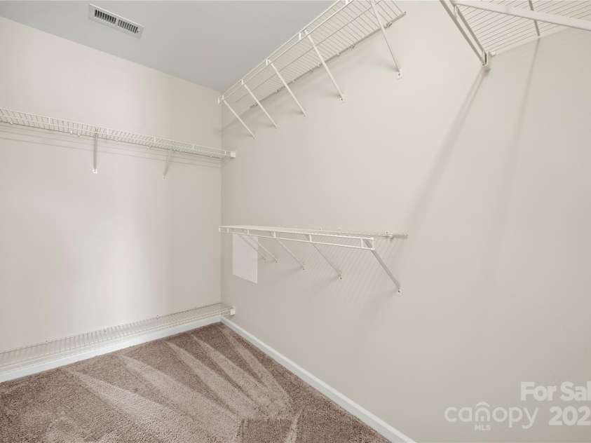 2008 Astoria Drive, Monroe, NC 28110.  MLS# CAR4288300, YatesRealty ID 31191. Primary Bedroom Walk-in-Closet